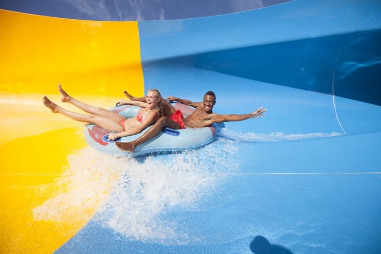 Happy guests take the plunge at Slide and Splash waterpark in Lagoa