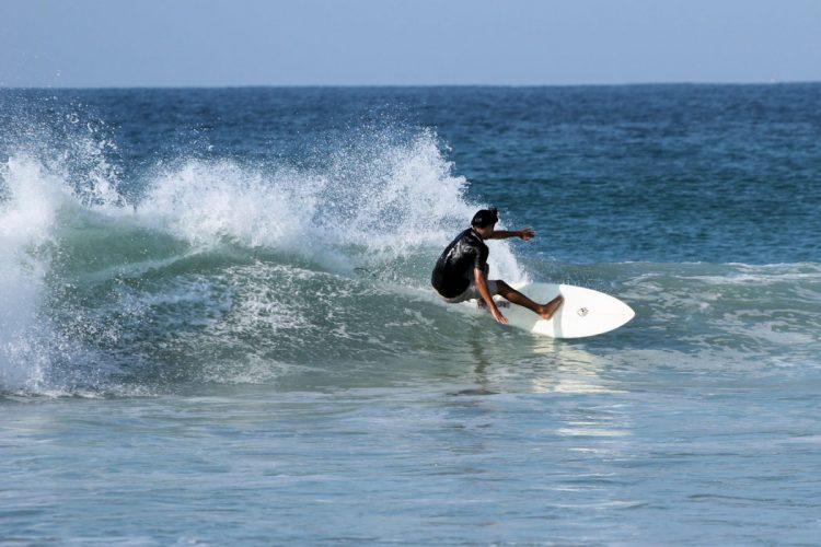 A surfer riding the waves of the Atlantic