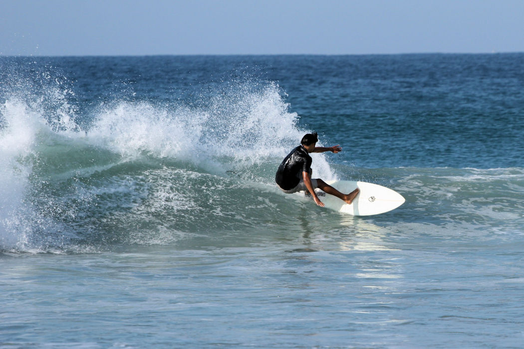 A surfer riding the waves of the Atlantic