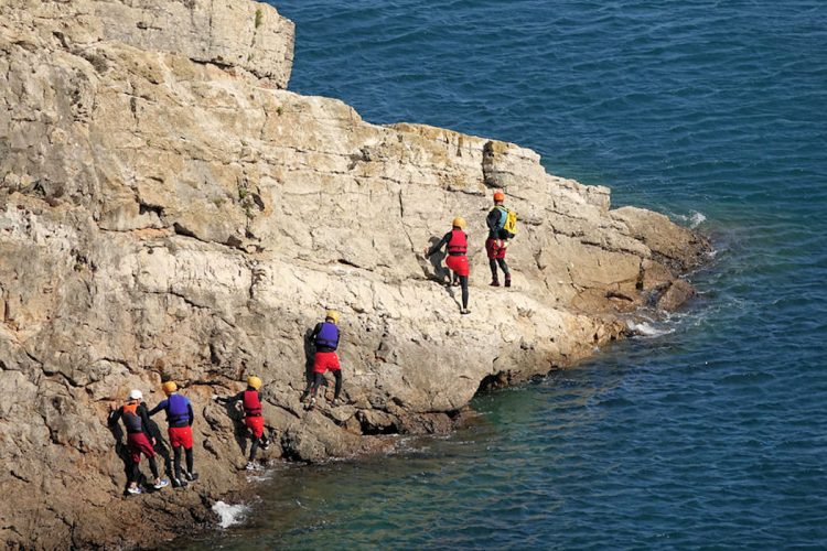 Take an Ocean Villas guided coasteering tour on the cliffs