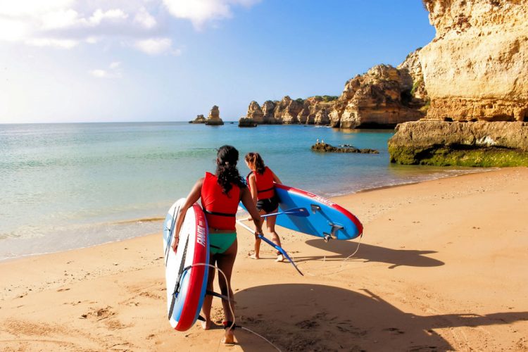 Two Ocean Villas guests begin their Stand Up Paddleboard experience
