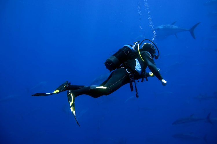 An Ocean Villas guest enjoying a Scuba dive one day course