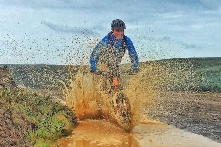 An Ocean Villas muddy mountain bike tour around an extinct volcano