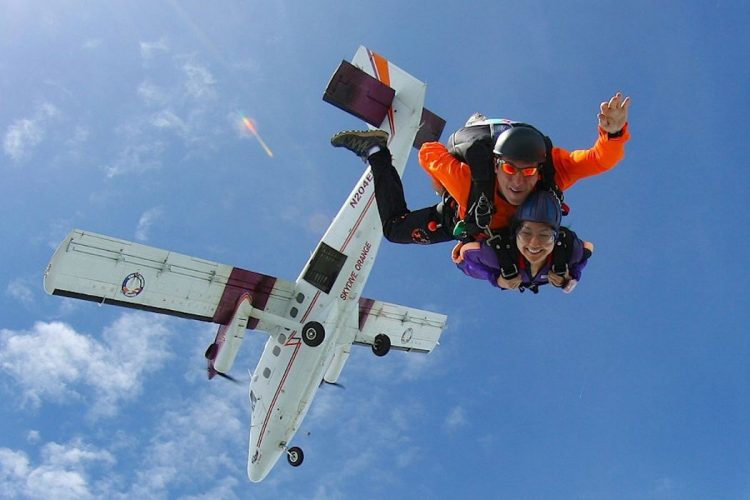 An Ocean Villas guest with instructor on a Tandem skydive near Portimao