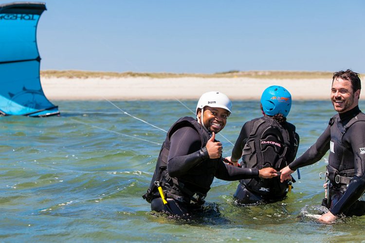 A kitesurfer from Ocean Villas feeling great about his day