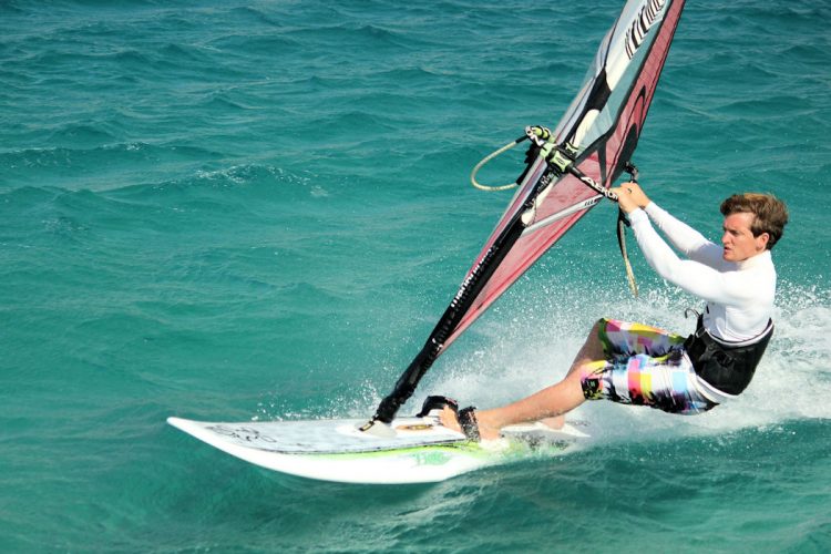 An Ocean Villas guest windsurfing on the Atlantic Ocean