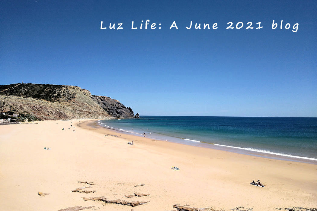 The view of the main beach of Praia da Luz with its creamy sands and azure ocean. The perfect place to work as a digital nomad